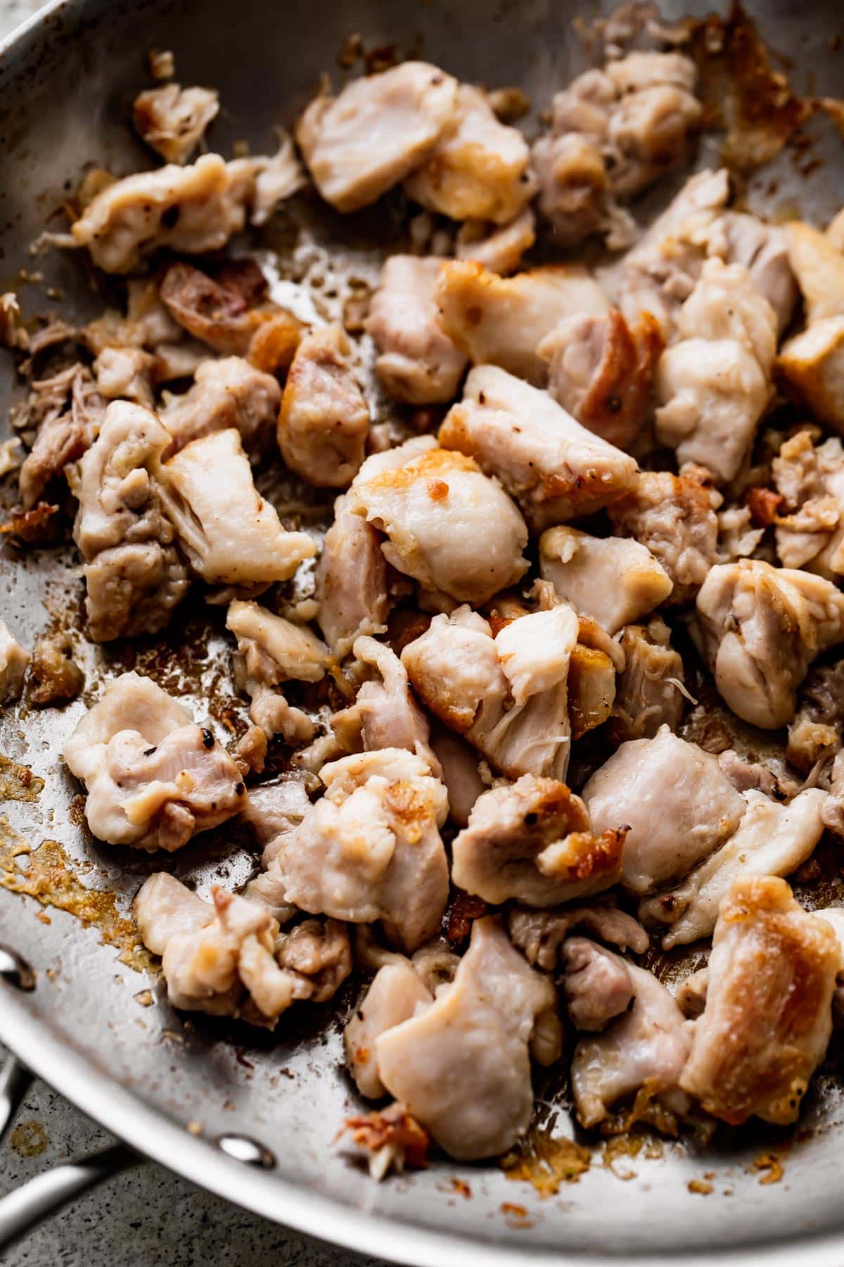 Browning chicken pieces to make chicken stir fry.