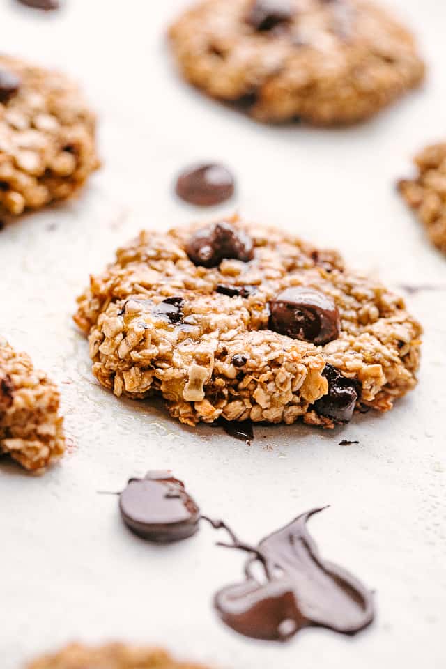 Banana oats chocolate chip cookies on a baking sheet.