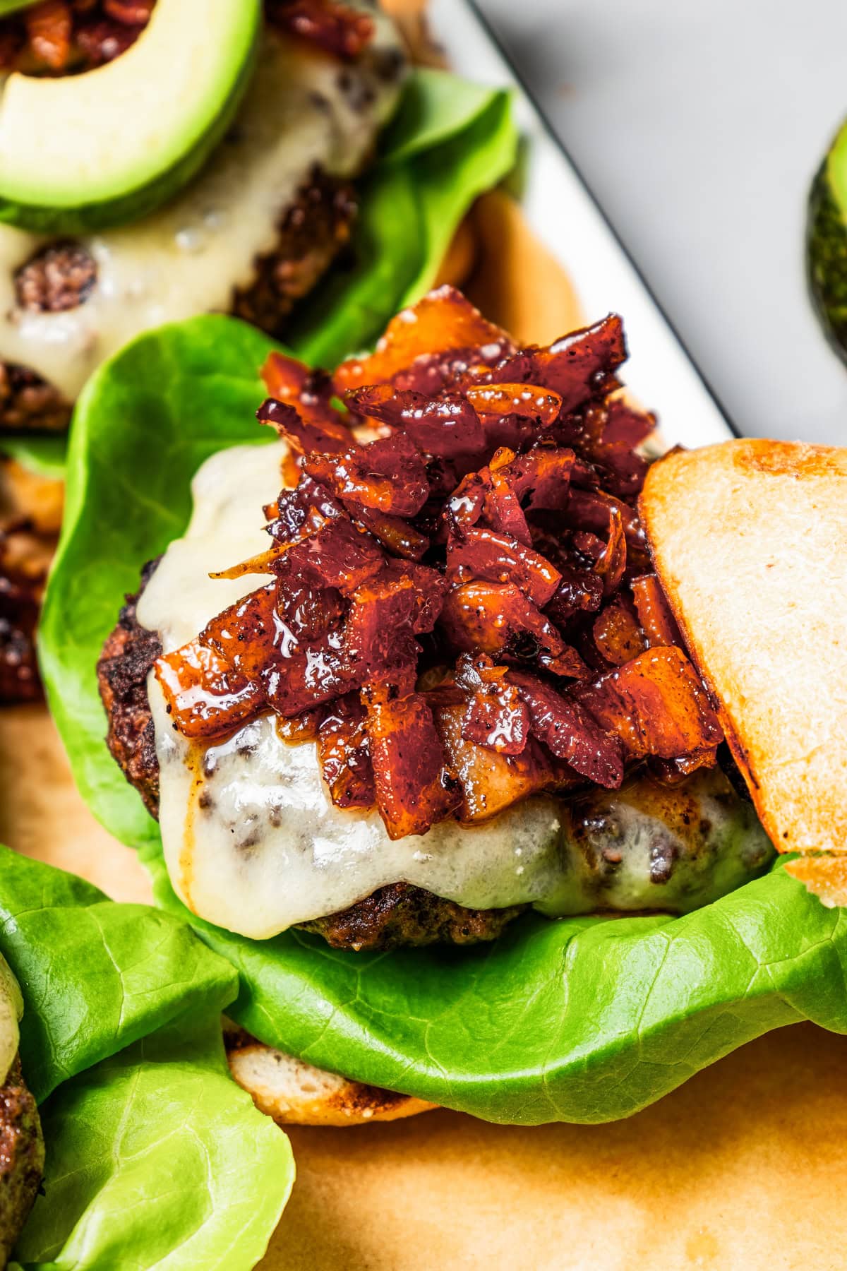 Bacon jam arranged over a burger patty.