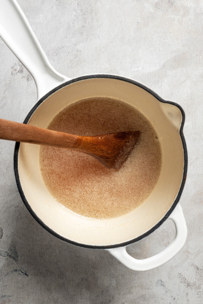 Boiling the syrup in a small pot. 