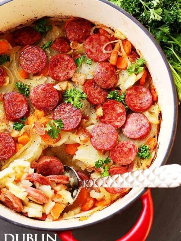 Dublin coddle in the Dutch oven with fresh parsley on top.