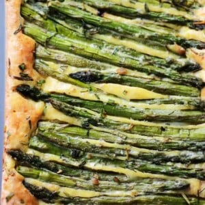 Stalks of asparagus baked into a cheesy frittata.