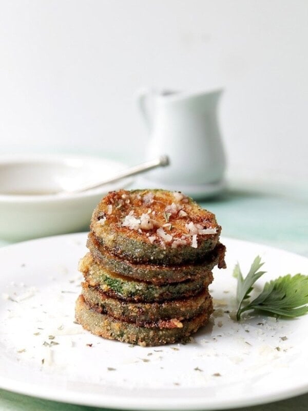 Fried Zucchini with Garlic Vinaigrette | www.diethood.com | Zucchini rounds coated in breadcrumbs, fried to a crisp, and dressed with a drizzle of a garlic vinaigrette. | #zucchini #recipes