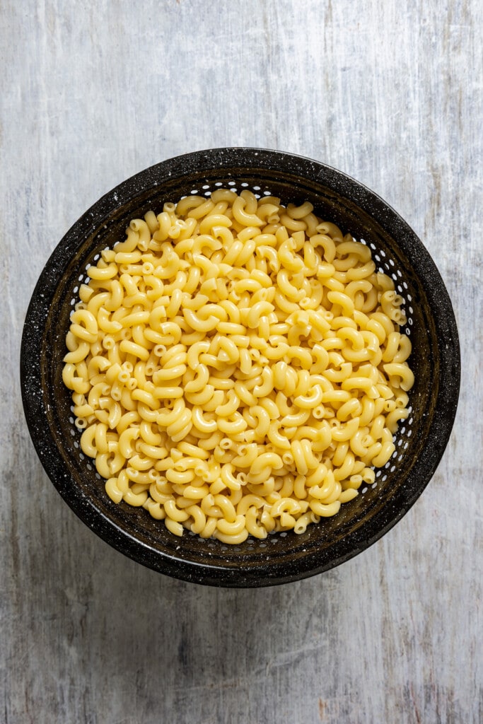 Draining pasta in a colander.