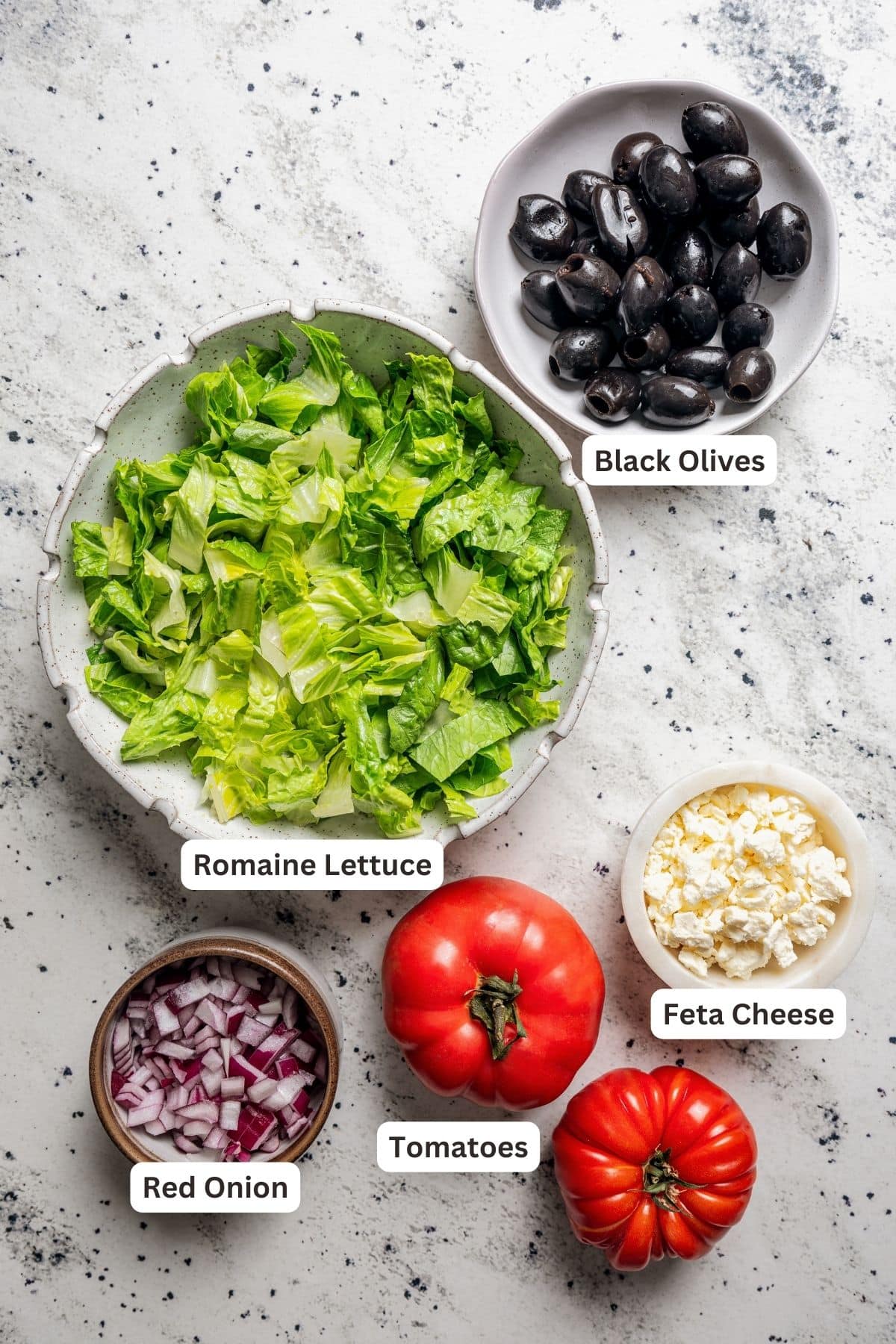 Labeled ingredients for Mediterranean salad.