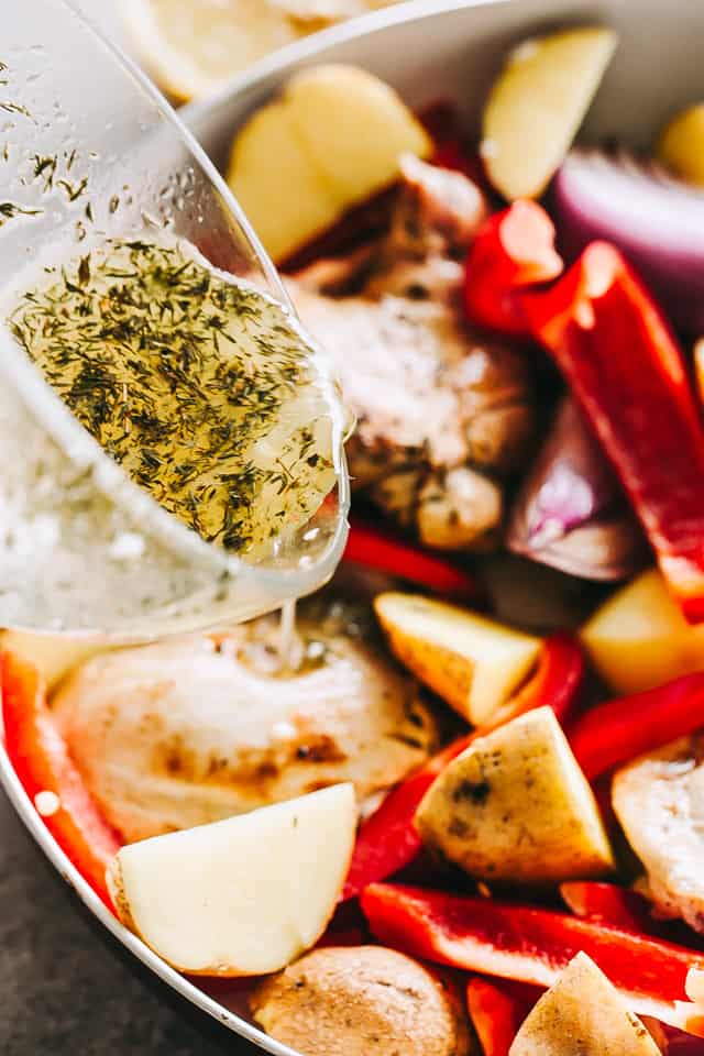 Pouring marinade into a skillet.