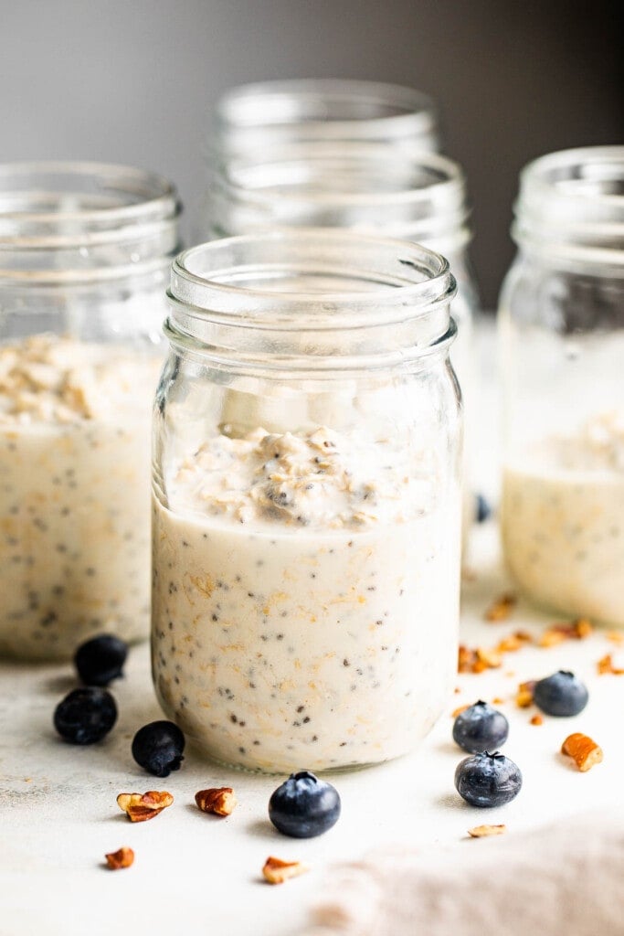 Milk and oats in mason jars.