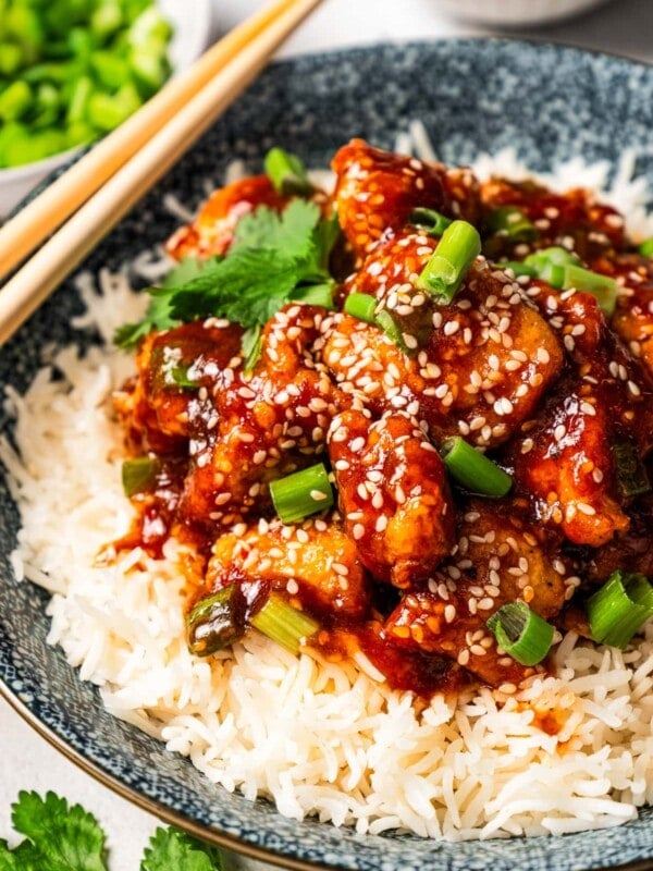 Sesame chicken served over white rice.