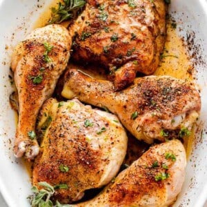 overhead shot of crispy baked chicken drumsticks and chicken thighs