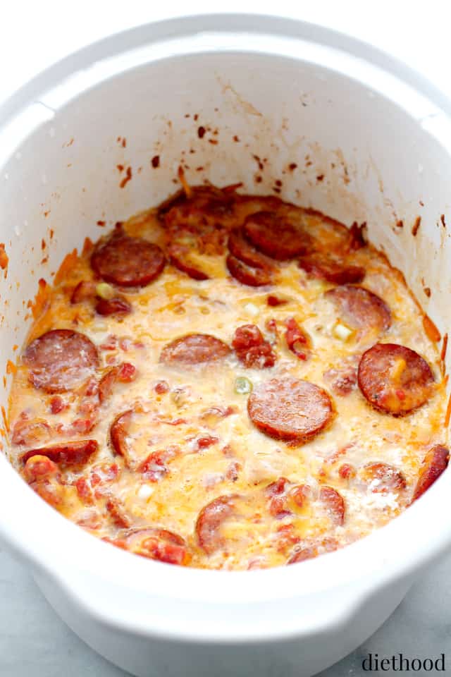 Melty cheese and sausage in the slow cooker. 