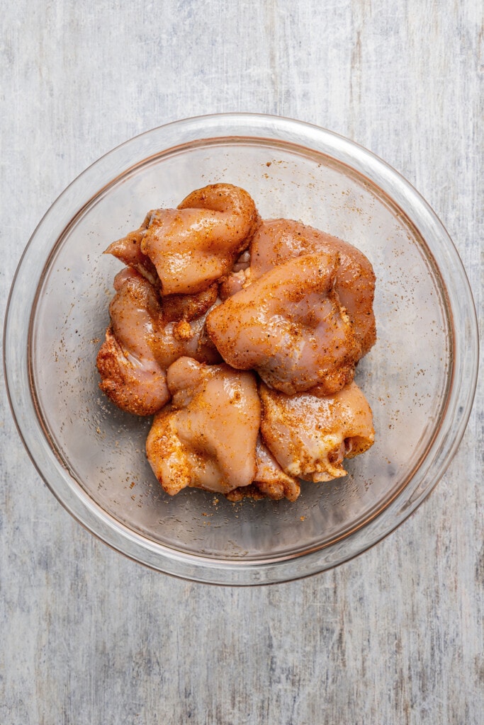 Seasoning chicken thighs with smoked paprika, lime, and more for Southwestern-style chicken.