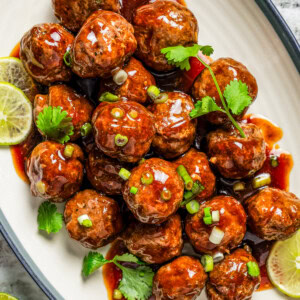 Overhead image of teriyaki meatballs arranged on a serving platter.