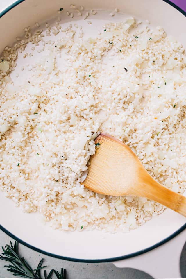 One Pan Risotto with Garlic Herb Tilapia – Delicious, garlicky tilapia set over a flavorful bed of rice, all baked to a creamy perfection!