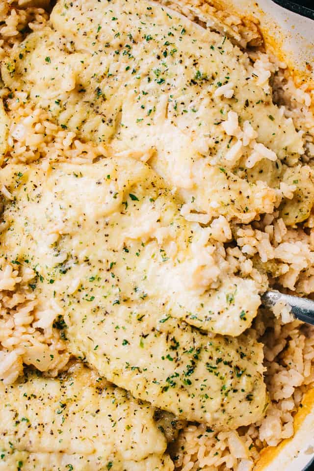 One Pan Risotto with Garlic Herb Tilapia – Delicious, garlicky tilapia set over a flavorful bed of rice, all baked to a creamy perfection!