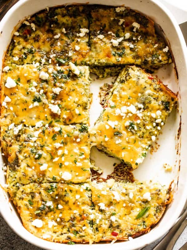 overhead shot of zucchini egg bake in a white baking dish.